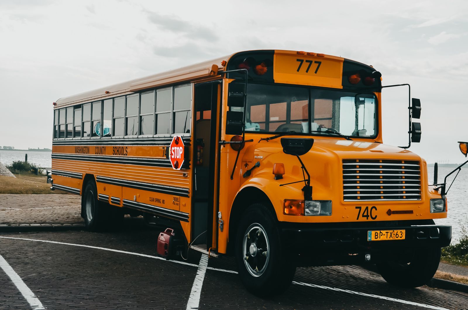 Yellow school bus on a road